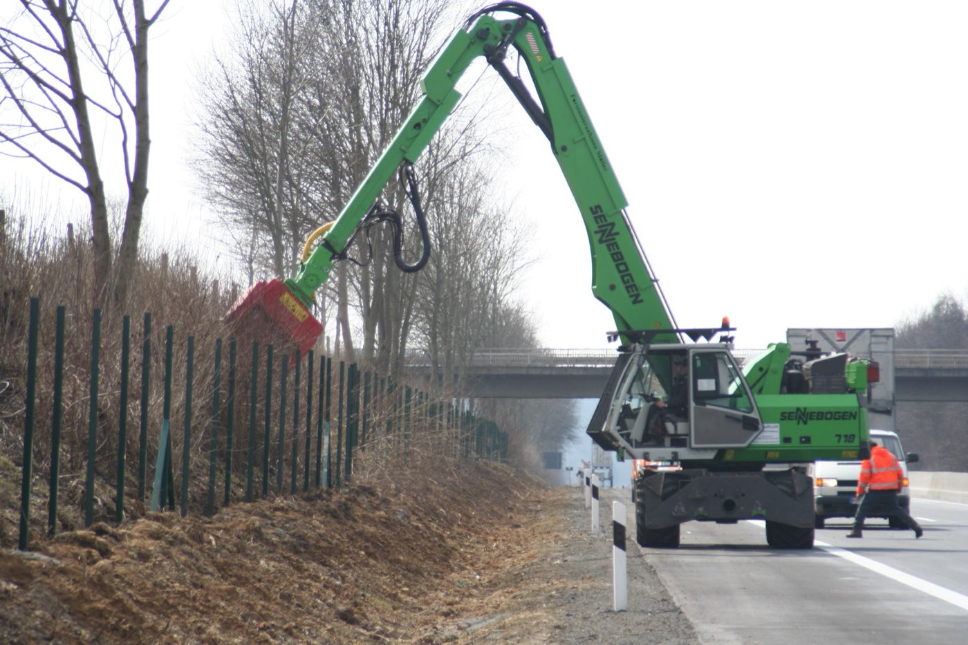 Forestry mulcher clearing brush